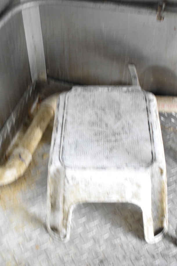 Interior view of a 2019 Diamond Cargo 8.5'x24' food trailer, showing worn grease hood area with visible ductwork and metal surfaces.