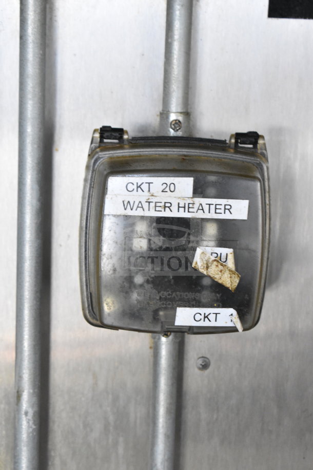 Close-up of a labeled switch box in a 2019 Diamond Cargo 8.5'x24' food trailer, indicating "CKT 20 Water Heater."