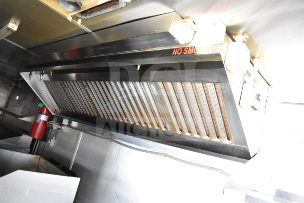 2019 Diamond Cargo 8.5'x24' food trailer interior with grease hood, suppression system, and visible "No Smoking" sign.