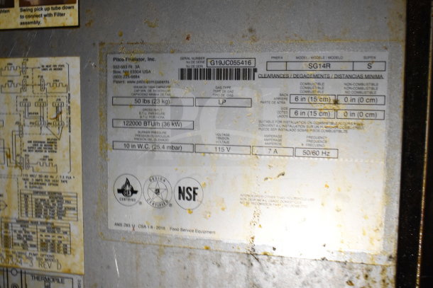 Label inside a 2019 Diamond Cargo 8.5'x24' food trailer. Details show Pitco Fryer model SG14R specs: 50 lbs capacity, 122000 BTU.