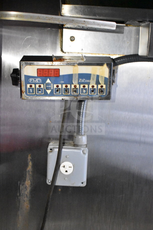 Control panel inside 2019 Diamond Cargo 8.5'x24' food trailer with grease hood, suppression system, and refrigeration.