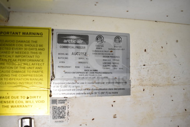 Label of Arctic Air Commercial Freezer model AUC27FZ, showing specifications, refrigerant type, and manufacturer info.
