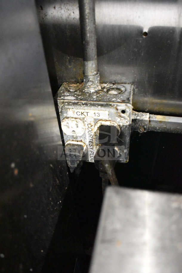 2019 Diamond Cargo food trailer outlet with "CKT 13" and "COURTESY PLUG" labels, showing usage wear.