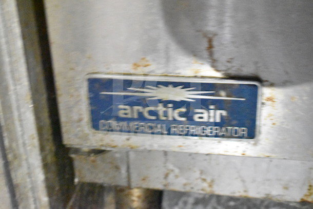Arctic Air commercial refrigerator label on a 2019 Diamond Cargo food trailer, featuring grease hood and fryer.