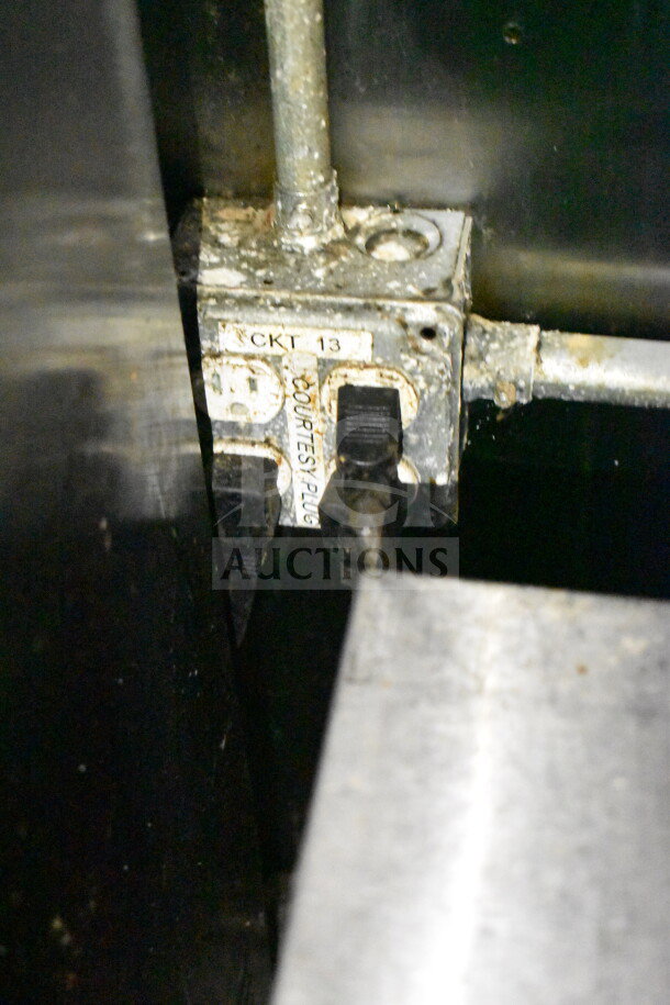 Close-up of electrical panel inside a 2019 Diamond Cargo 8.5'x24' food trailer, showing circuit labels: "CKT 13" and "COURTESY PLUG."