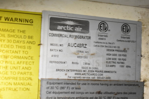 Label on 2019 Diamond Cargo food trailer's Arctic Air refrigerator. Model: AUC48RZ, Refrigerant: R600a, 2.65 oz.