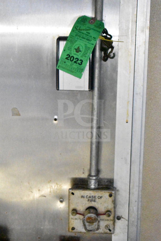 Fire suppression system with a 2023 inspection tag for a 2019 Diamond Cargo 8.5'x24' food trailer.