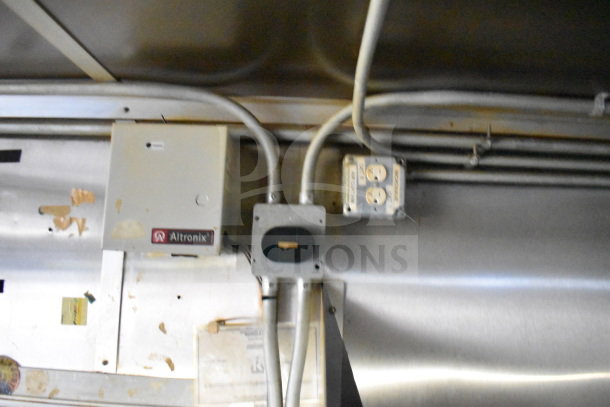 2019 Diamond Cargo 8.5'x24' food trailer interior with wiring and Altronix electrical box visible.
