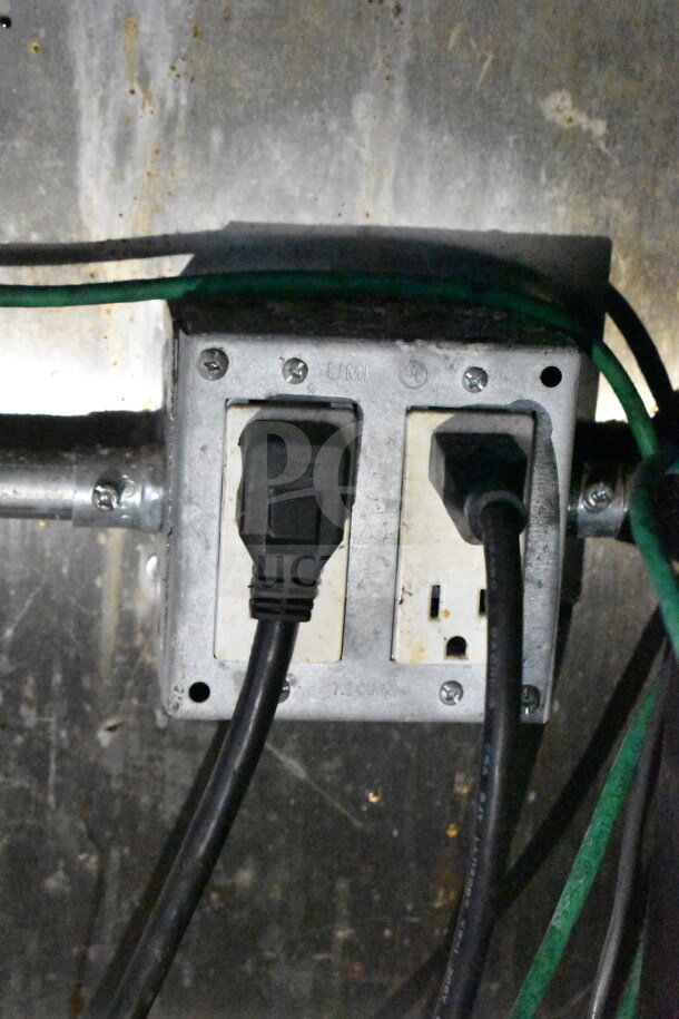 Power outlet inside the 2019 Diamond Cargo 8.5'x24' food trailer. Functional electrical setup for appliances.