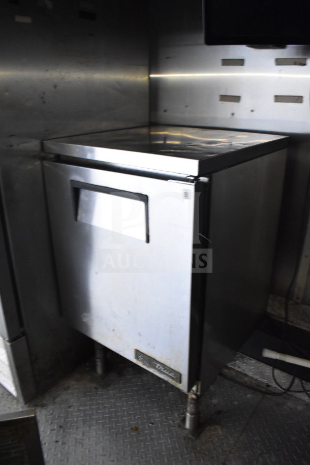 2019 Diamond Cargo 8.5'x24' food trailer interior; features refrigeration unit, grease hood, and suppression system.