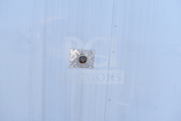 2019 Diamond Cargo 8.5'x24' food trailer exterior detail, showing metal panel attachment.