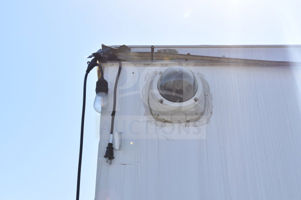 2019 Diamond Cargo 8.5'x24' food trailer exterior with wiring and camera. Includes grease hood, suppression system, and fryer.