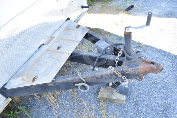 2019 Diamond Cargo 8.5'x24' food trailer hitch with rust and chains, featuring grease hood and cooling system.