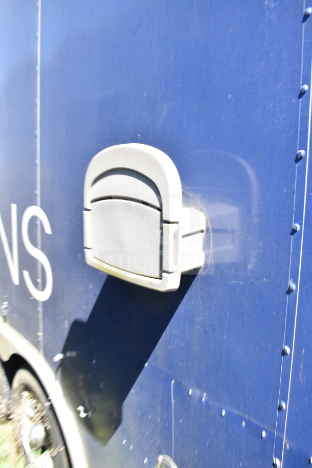 2019 Diamond Cargo 8.5'x24' food trailer, blue exterior, visible vent detail. Equipped with grease hood, suppression system.