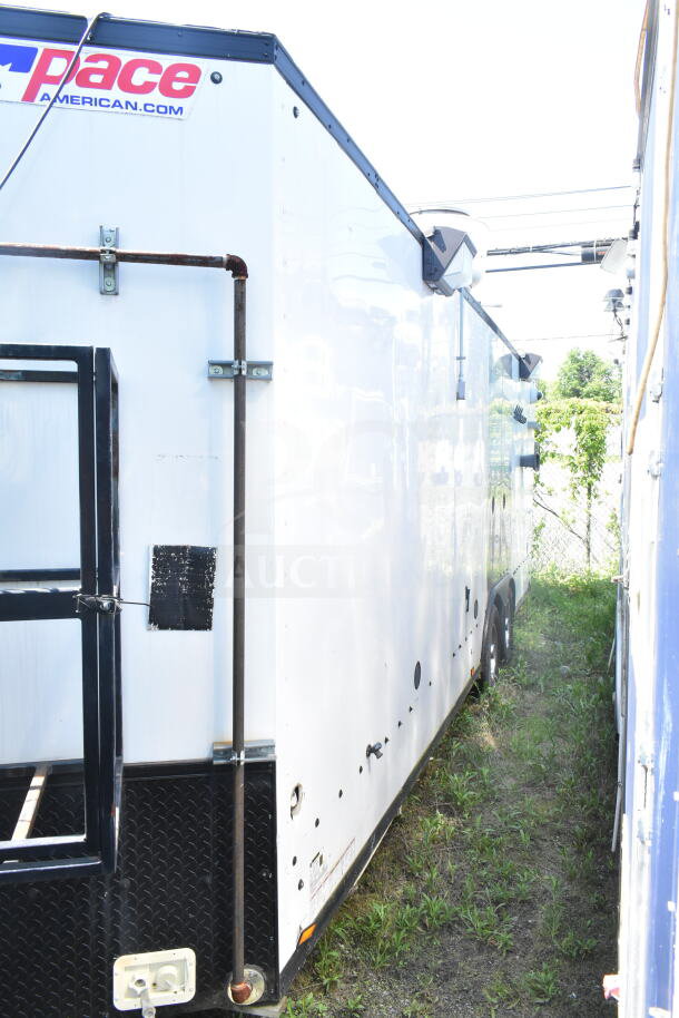 2020 LGS TX 8.5'x24' food trailer with CaptiveAire grease hood, suppression system, refrigeration, and griddle.