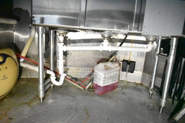 2020 LGS TX 8.5'x24' food trailer interior plumbing. Visible pipes, grease hood, and chemical container.