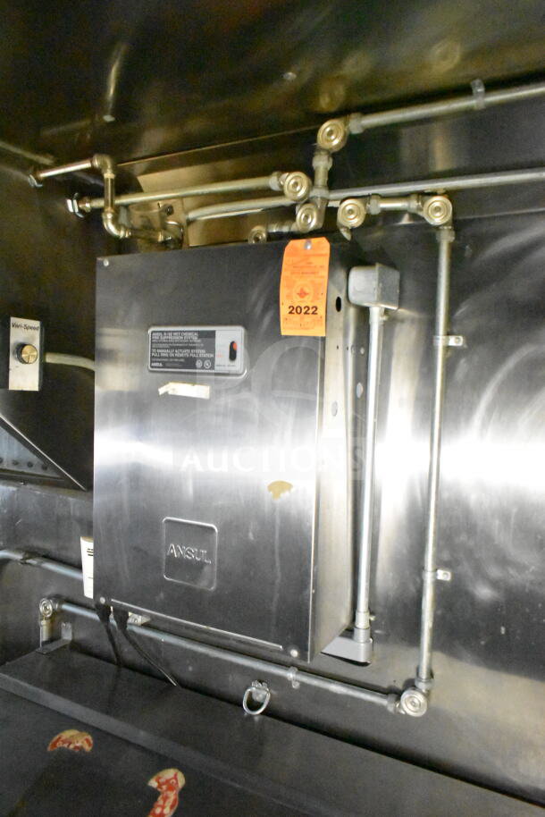 2020 LGS TX food trailer's CaptiveAire grease hood and suppression system with inspection tag, stainless steel finish.