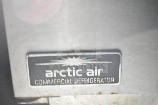 Arctic Air Commercial Refrigerator label on a 2020 LGS TX food trailer, featuring refrigeration and CaptiveAire grease hood.