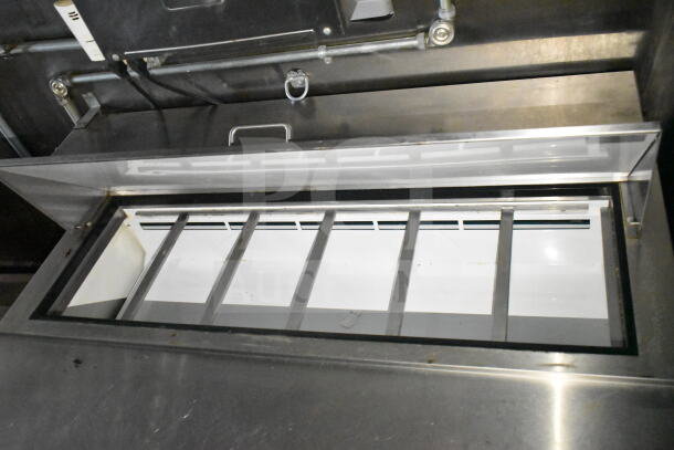 2020 LGS TX 8.5'x24' food trailer interior, showcasing the CaptiveAire grease hood system in clean condition.
