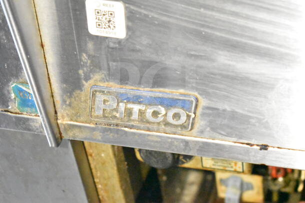 Close-up of a Pitco appliance label on a 2020 LGS TX food trailer, showing signs of wear and use.