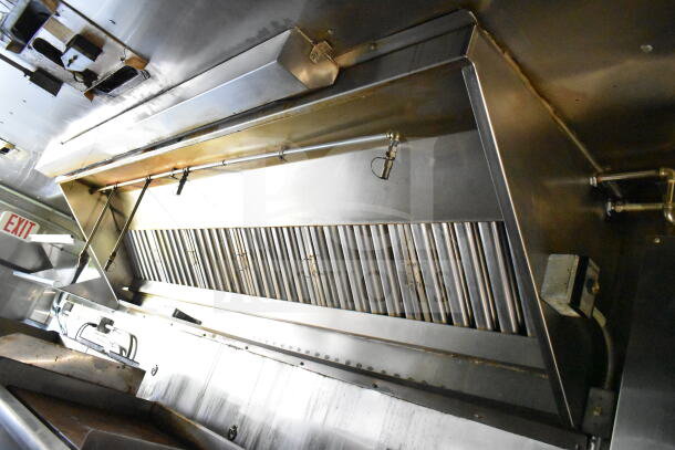 2020 LGS TX 8.5'x24' food trailer interior with CaptiveAire grease hood and suppression system, clean stainless steel.
