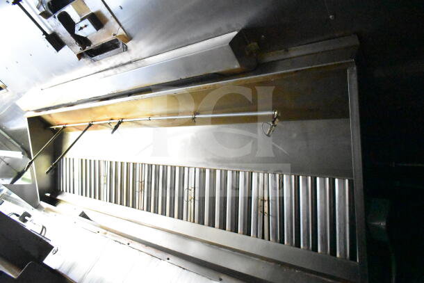 2020 LGS TX 8.5'x24' food trailer interior showing CaptiveAire grease hood and suppression system.