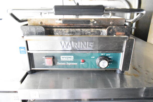 Waring Commercial Tostato Supremo sandwich press in used condition, featuring temperature controls and an On/Off switch.