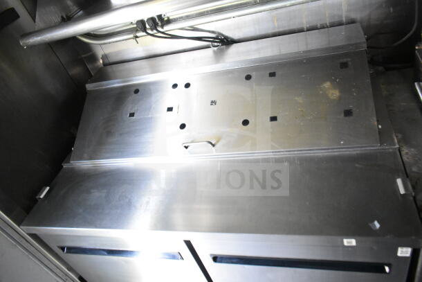 2020 LGS TX food trailer interior with CaptiveAire grease hood. Stainless steel surfaces, clean and well-maintained. VIN: 53BPTEB26MR003733.