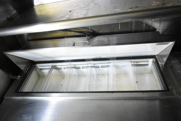 2020 LGS TX food trailer interior showing refrigeration unit with multiple compartments and stainless steel finish.