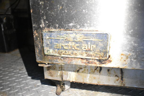 Rusty Arctic Air Commercial Refrigerator tag inside 2020 LGS TX 8.5'x24' Food Trailer, includes CaptiveAire hood system.