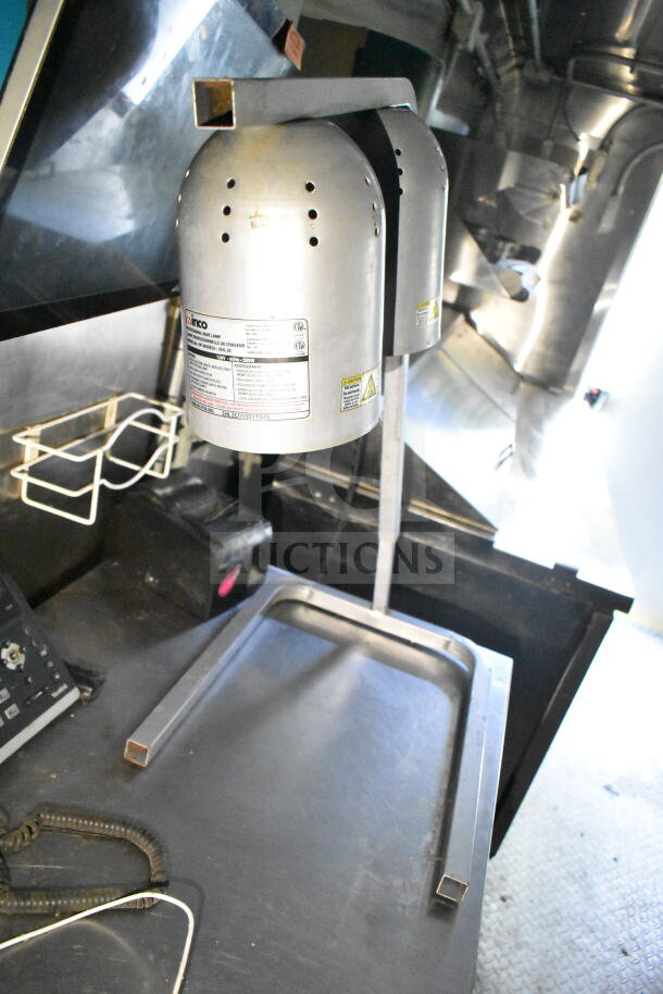 2020 LGS TX 8.5'x24' food trailer interior with CaptiveAire grease hood and suppression system.