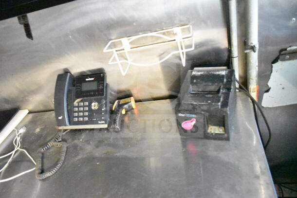 Interior of 2020 LGS TX 8.5'x24' food trailer featuring a Verizon office phone, receipt printer, and wired setup on a stainless steel counter.