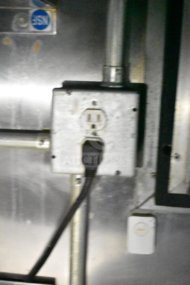 Electrical outlet panel inside a 2020 LGS TX 8.5'x24' food trailer, featuring a visible power cable connection.