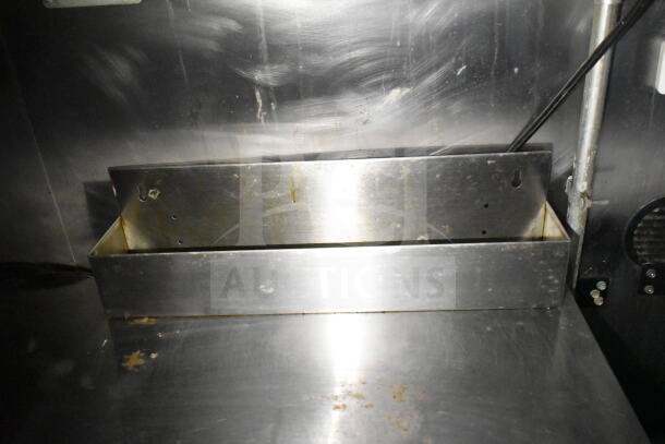 2020 LGS TX 8.5'x24' food trailer, stainless steel interior showing grease buildup, part of CaptiveAire hood system.