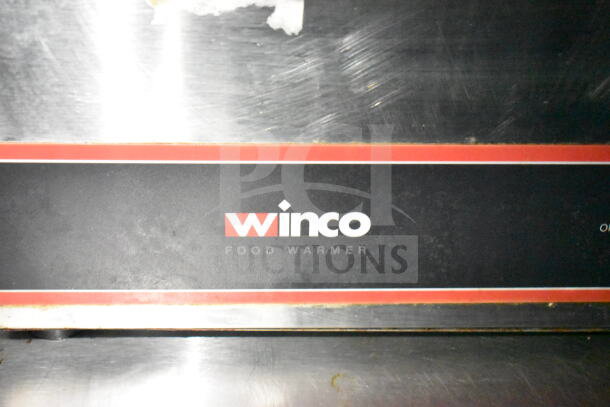 Winco food warmer label on stainless steel surface, part of 2020 LGS TX food trailer kitchen equipment.