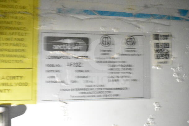 Label on Arctic Air commercial freezer model AF32Z, shows design pressure and electrical rating details.
