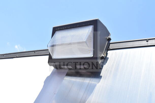 Exterior light fixture mounted on the 2020 LGS TX 8.5'x24' food trailer.