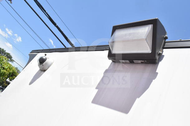 2020 LGS TX 8.5'x24' food trailer exterior, featuring security camera and light fixture.