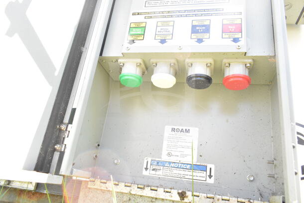 Electrical connection panel of a 2020 LGS TX 8.5'x24' food trailer, showing labeled outlets and plugs for power supply.