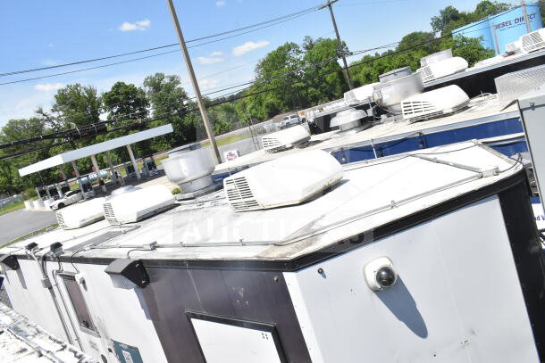 2020 LGS TX 8.5'x24' food trailer roof, featuring CaptiveAire grease hood, suppression system, and refrigeration vents.