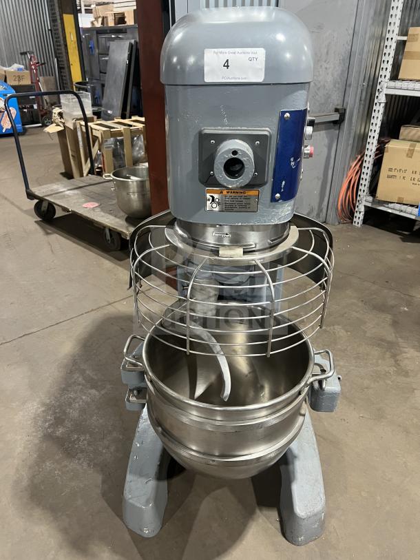 Hobart HL661 commercial mixer, blue, with stainless steel bowl and guard. 200-240V, 1 phase, on legs. Model and warning labels visible.