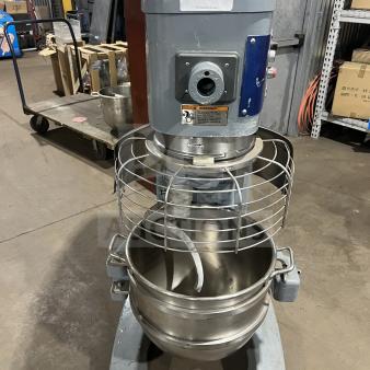 Hobart HL661 commercial mixer, blue, with stainless steel bowl and guard. 200-240V, 1 phase, on legs. Model and warning labels visible.