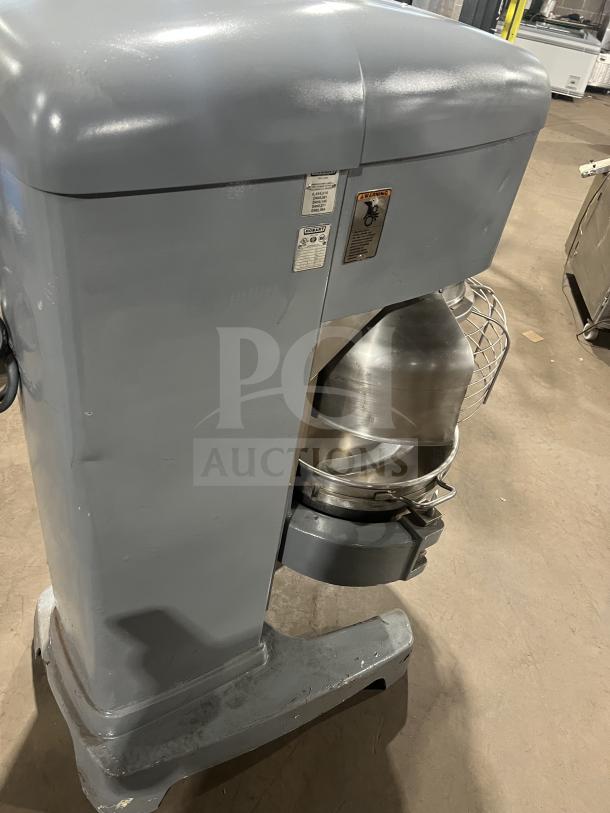 Hobart HL661 blue commercial planetary mixer with stainless steel bowl guard and mixing bowl, on legs, 200-240V, 1 phase.