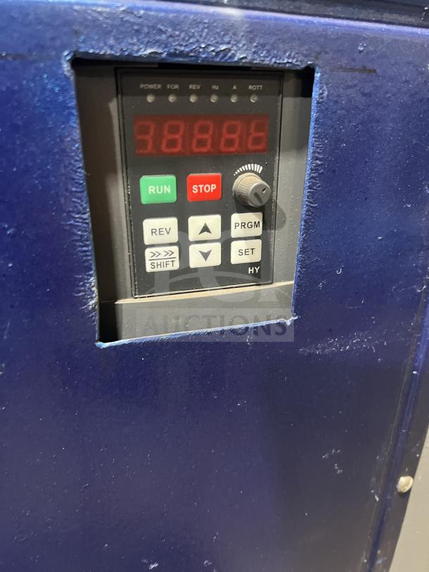 Close-up of Hobart HL661 mixer control panel, blue casing, multiple buttons including run and stop, digital display reading "38888".