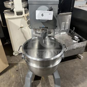 Univex floor-style planetary mixer with stainless steel mixing bowl, gray finish, on legs, appears in good condition.