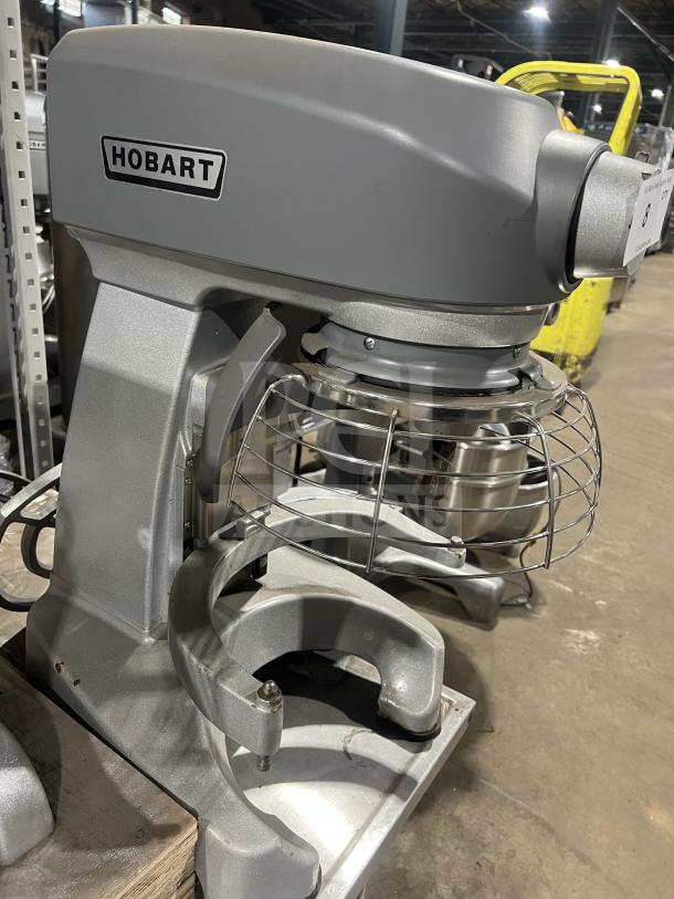 Hobart commercial countertop bowl lift planetary mixer, multi-speed, 100-120V, 1 phase, with visible Hobart logo in good condition.