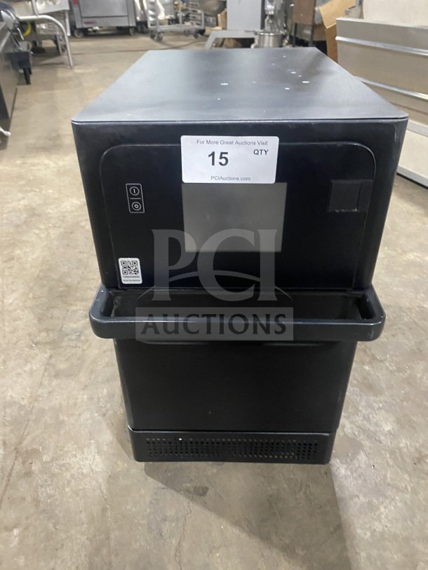 MerryChef Eikon E2S electric countertop high-speed oven, black; model SN: 2209213090728. Appears in good condition.