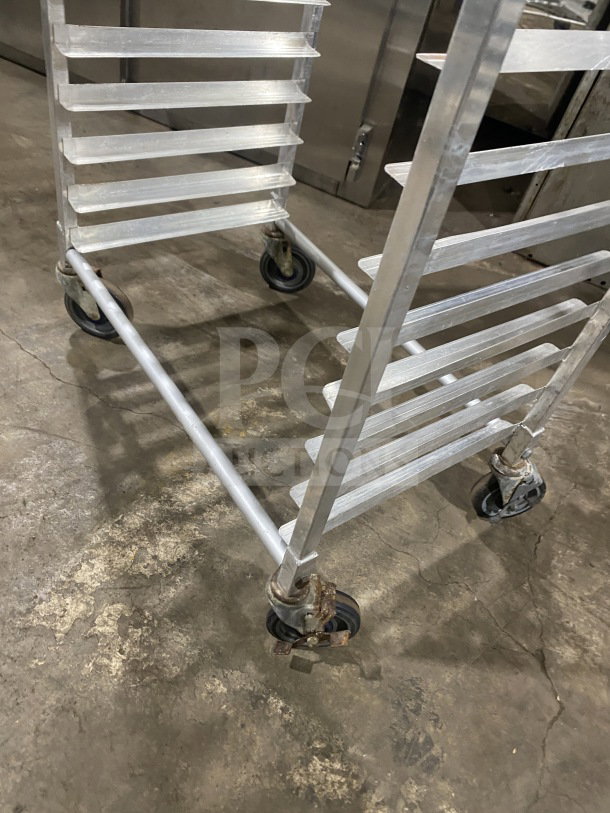 Regency stainless steel welded pan rack, model 109APR1820L, on casters. Suitable for commercial use, in good condition.