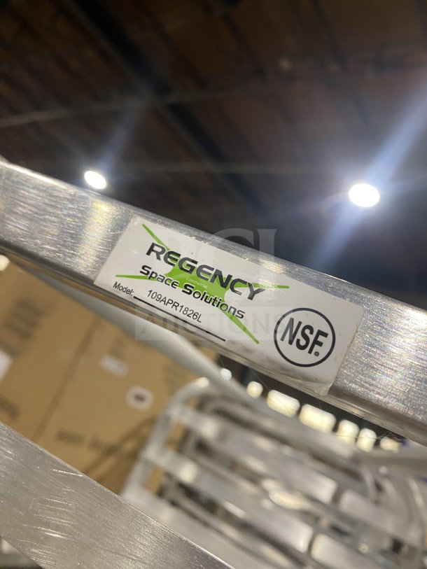 Regency Space Solutions stainless steel pan rack, model 109APR1826L, NSF certified, in good condition.