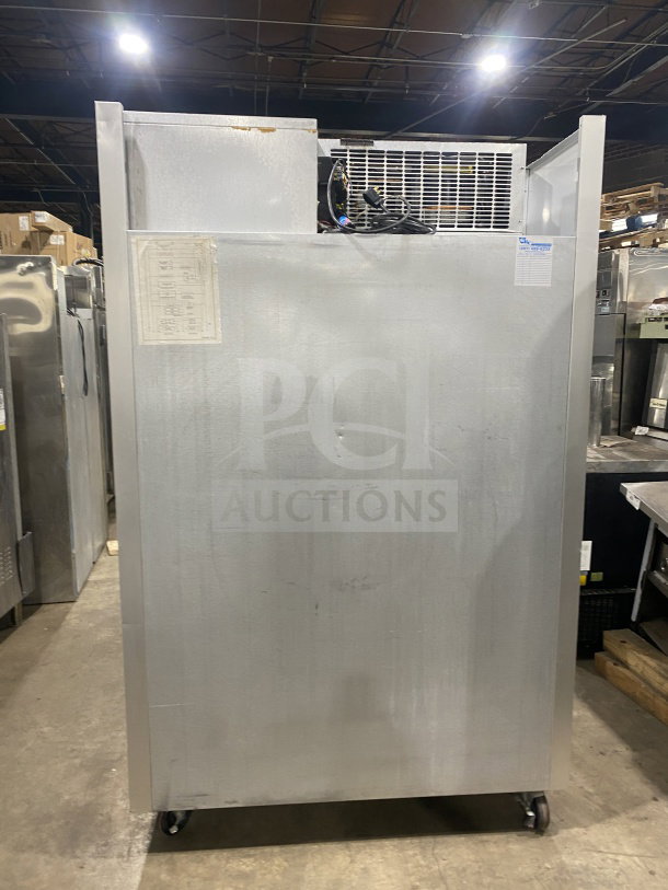 Traulsen G22010 stainless steel 2-door reach-in refrigerator, poly-coated rack, 115V, on casters, serial T987554JO8.